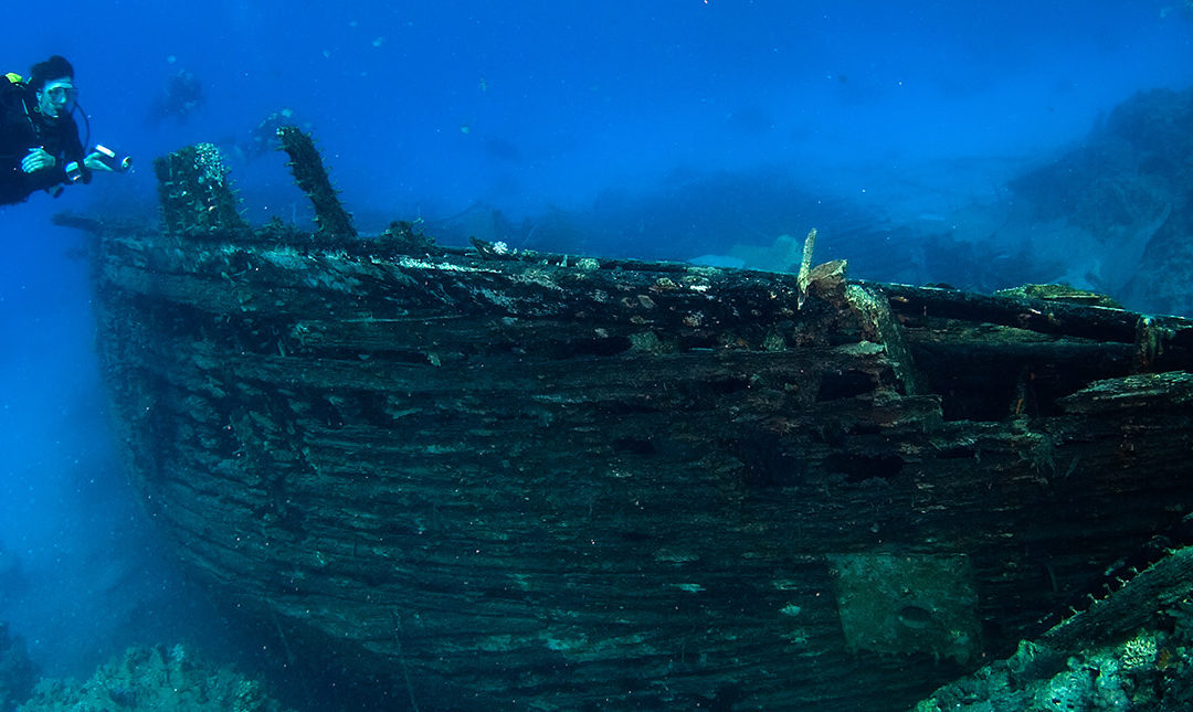 Diver with a shipwreck